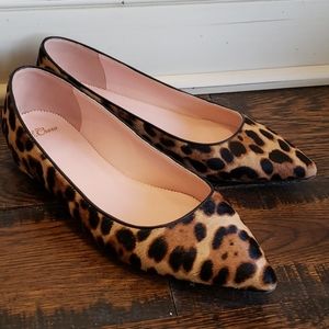 Pointed-toe flats in leopard calf hair